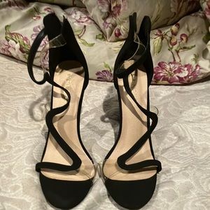 Sexy 4 inch heels Only worn one time. Zip back to close.